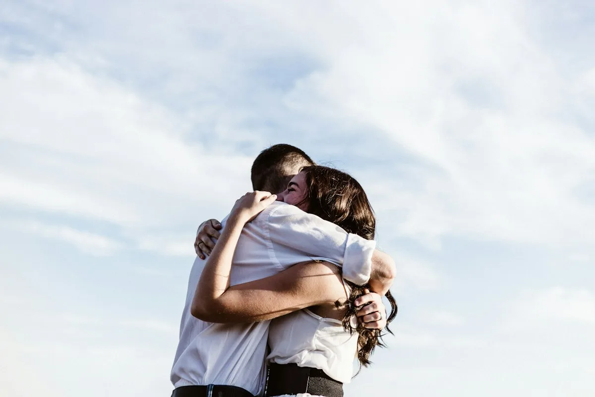 A couple hugging each other.